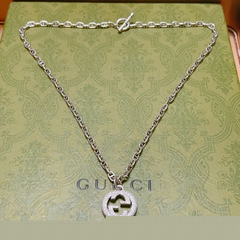 G*u*i necklaces